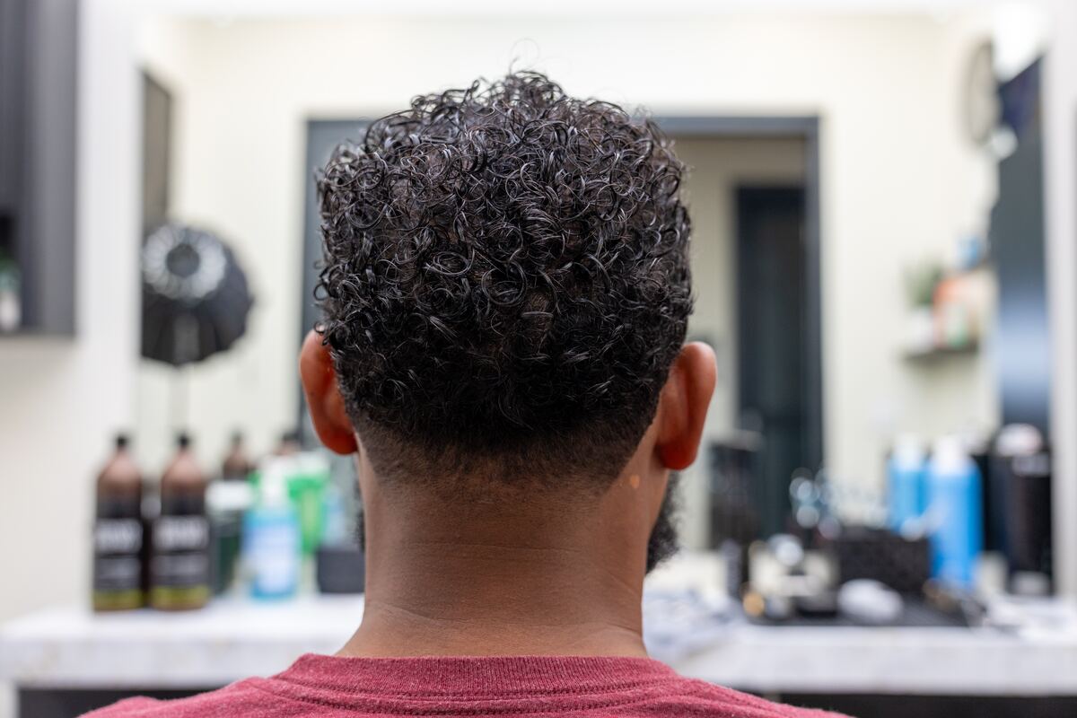 Back view of the finished cut, showing the taper through the nape