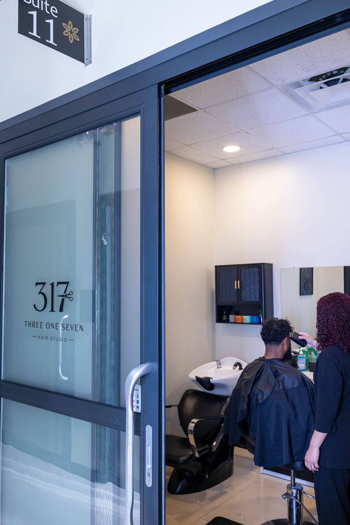 The Suite 11 entrance to Three One Seven Hair Studio at 300 N Entrance Rd, Sanford